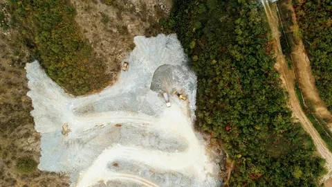 Aerial view of opencast mining quarry Stock Footage 132320235