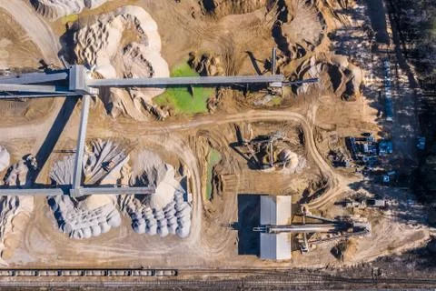 Aerial view of opencast mining quarry. Industrial place view from above Stock Photos