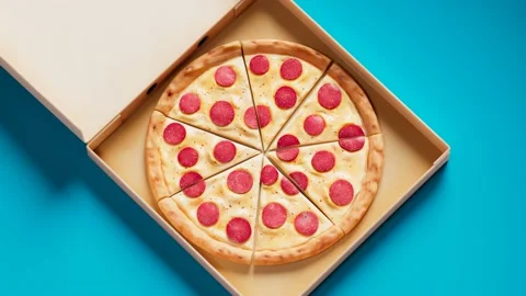 Aerial view of an opening pizza box while lunchtime.Hands taking slices of pizza Stock Footage 133424909