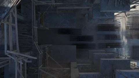 Aerial View: Operator navigates tall ladders confidently, assembling crane parts Vídeo Stock 296025205