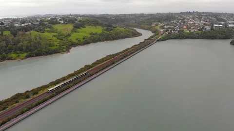 Aerial view of Orakei with a moving train in NZ Stockbeeldmateriaal 97788904