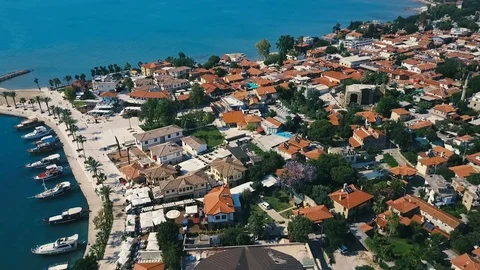 Aerial view of the orange rooftops of the old coast city near the mediterranean Stock-Footage 77454708