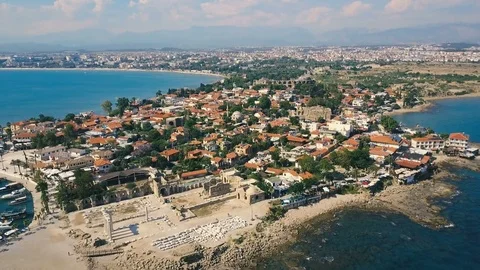 Aerial view of the orange rooftops of the old coast city near the mediterranean Stock Footage 77459053