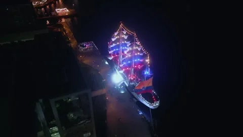 Aerial view, orbit of an old sailing ship docked in the port of Halifax, Canada. Stock Footage 250274895