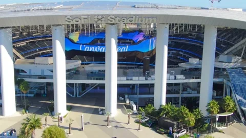 Aerial View of Orbit Shot Past SoFi Stadium Exterior in Inglewood California Stock Footage 334696248