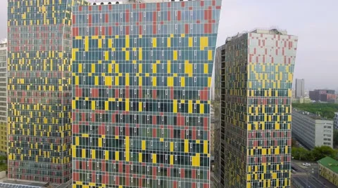 Aerial view orbiting around modern office buildings, establishing shot. Video stock 66033203