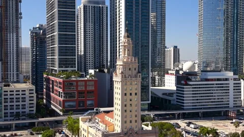 Aerial view orbiting the Freedom Tower in downtown Miami Florida Stock Footage 329659788