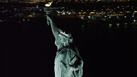 Aerial view of orbiting Statue of Liberty and Upper Bay, New York City, dark nig Stock Footage 199456889
