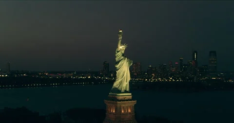 Aerial view orbiting the Statue of Liberty and skyline of Manhattan, New York, n Stock Footage 199458800