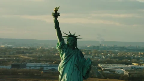Aerial view of orbiting the Statue of Liberty to downtown Manhattan during the d Stock Footage 199463208
