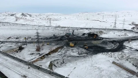 Aerial view of ore storage producing copper in winter. Large industrial area Stock Footage 75296154