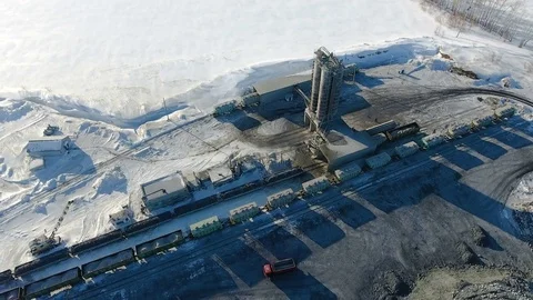 Aerial view of ore storage producing copper in winter. Large industrial area Video stock 75348690