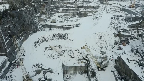 Aerial view of ore storage producing copper in winter. Large industrial area Stock Footage 126689542