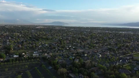 Aerial view of Orem and Provo Utah with lake and mountains in the background Stock Footage 130667635