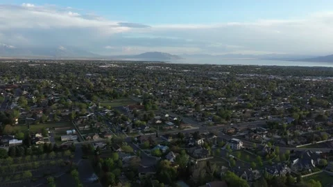 Aerial view of Orem and Provo Utah with lake and mountains in the background Video stock 146924767