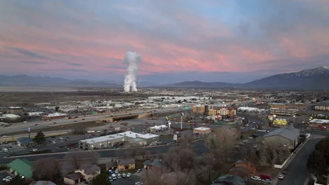 Aerial view of Orem Utah with power station in the distance at sunrise Stock Footage 166473546