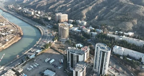 Aerial view of Ortachala district at sunset. cityscape over Kura river Stock-Footage 175767419