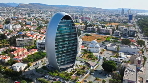 Aerial view of The Oval tower in Limassol, Cyprus. Stock Footage 341641254