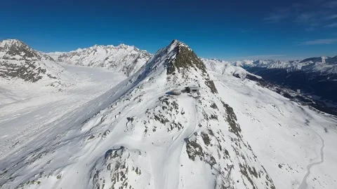 Aerial view over Aletsch Ski Resort, Grand Glacier, Swiss Alps Stock Footage 301734867