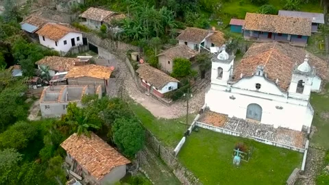 Aerial view over an ancient town, with houses with roof of clay bricks Stock Footage 139947656