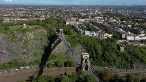 Aerial view over the Avon Gorge and Clifton Suspension Bridge, Bristol, England Stock Footage
