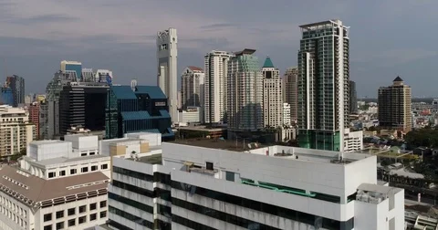 Aerial view over the Banyan Tree hotel, central Bangkok, mid day. Stock Footage 84367335