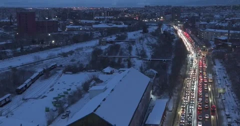 Aerial view over boulevard and pre-dawn traffic in winter Sofia Stock Footage 261022188