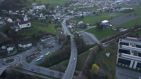 Aerial View Over Bridge and Roundabout With Smooth Morning Traffic Flow Видео 331441344