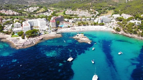 Aerial view over Camp de Mar with hotels and beaches, Costa de La Calma, Mall Stock Footage 100635545