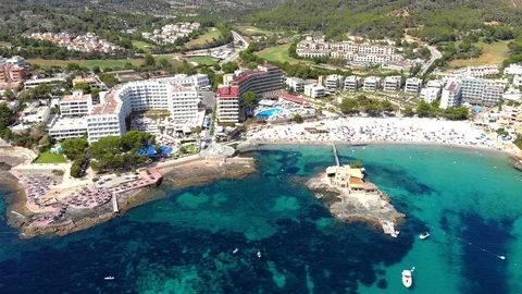 Aerial view over Camp de Mar with hotels and beaches, Costa de La Calma, Mall Stock Footage 100635699