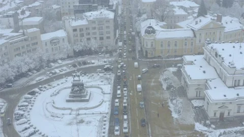 Aerial view over the center of Sofia with a boulevard with traffic in winter Stock Footage 166604836