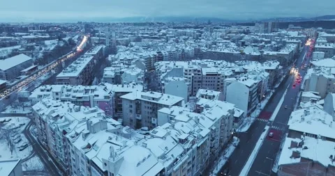 Aerial view over the city of Sofia with a boulevard and traffic in winter Stock Footage 261041481