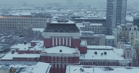 Aerial view over the city of Sofia with snowy architectural buildings Stock Footage 297780487