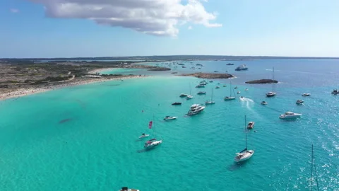 Aerial view over the clear beach and turquoise water of Formentera, Ibiza. 스톡 동영상 131237405