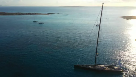 Aerial view over the clear beach and turquoise water of Formentera, Ibiza. 動画素材 132975417
