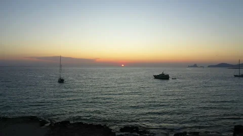 Aerial view over the clear beach and turquoise water of Formentera, Ibiza. 動画素材 132984454