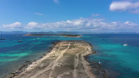 Aerial view over the clear beach and turquoise water of Formentera, Ibiza. 스톡 동영상 144806082