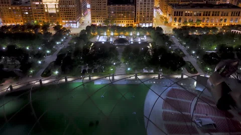Aerial view over Cloud Gate, Jay Pritzker Pavilion and Millennium Park, Chicago Stock Footage 321501825