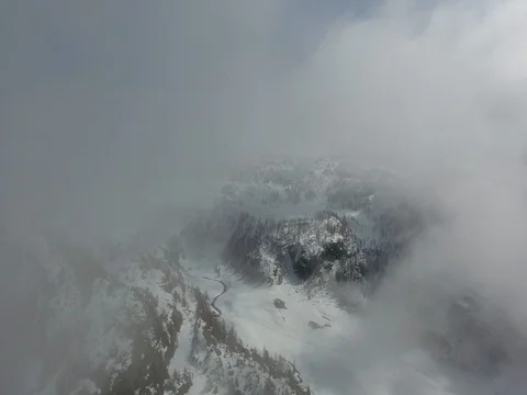 Aerial view over the clouds - High mountain Stock Footage 73918703