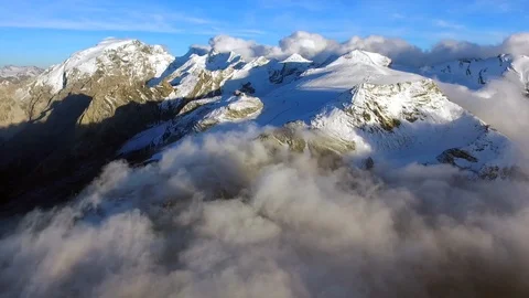 Aerial view over the clouds, mountain landscape Stock Footage 102765405
