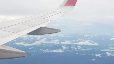 Aerial view over cloudscape from airplane flying with thick fog and cloud 動画素材 289815737