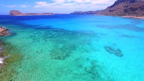 Aerial view over the coastline and Mediterranean sea, Crete, Greece Stock Footage 72656053