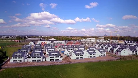 Aerial view over a construction site in a urban residential area. Stock Footage 75360277