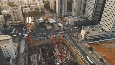 Aerial view over construction site at daytime. workers, engineers, cranes and Video stock 123651759