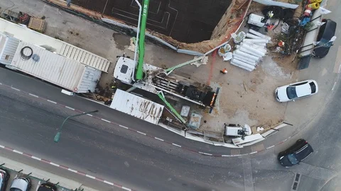 Aerial view over construction site at daytime. workers, engineers, cranes and Video stock 123661983