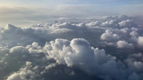 Aerial View Over Dense Cumulus and Stratus Cloud Layers Stock Footage 339791712