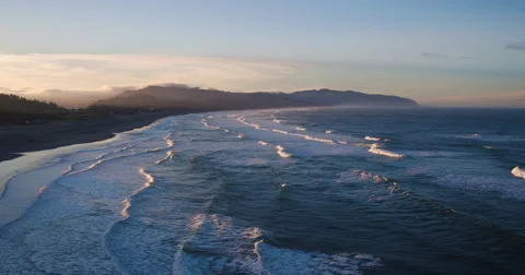 Aerial View Over Dramatic Coastline with Amazing Sunrise Light Stock Footage 62988050