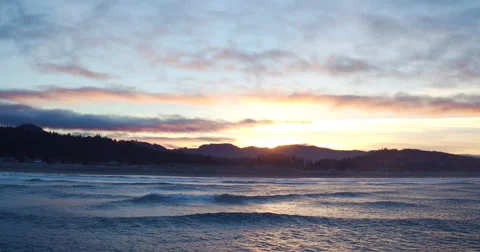 Aerial View Over Dramatic Coastline with Amazing Sunrise Light Video stock 62993322