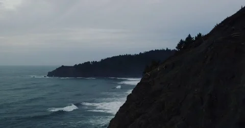 Aerial View Over Dramatic Coastline with Amazing Sunrise Light Stock Footage 62994626