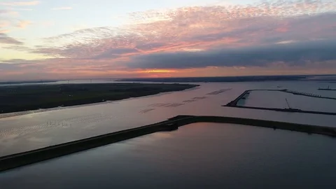 Aerial view over Eastern Scheldt at dusk 動画素材 81635965